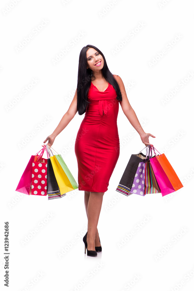 Woman in red dres after shopping isolated on white Woman in red dres after shopping isolated on white