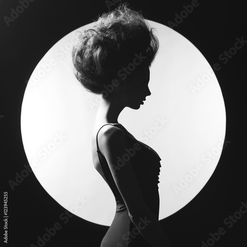Konstfotografi Elegant woman on geometric background