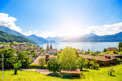 Landscape view on Weggis village on Lucerne lake with beautiful mountains on the фототапет