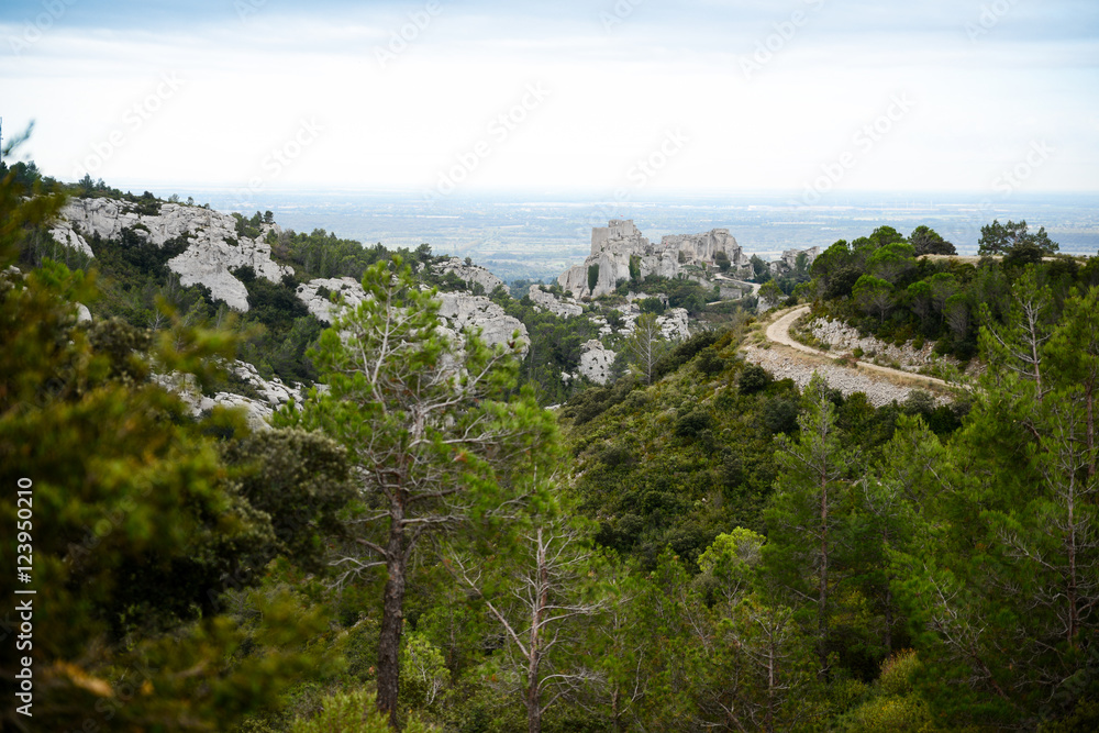 remote view of the antique fortress of les baux de provence in southern france