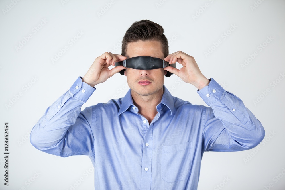 Man using virtual video glasses Man using virtual video glasses