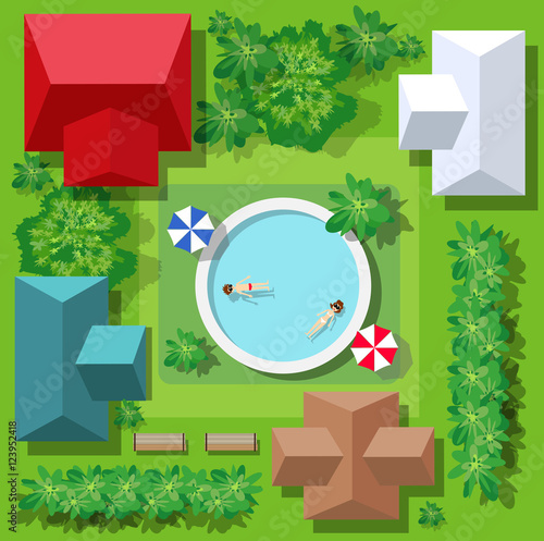 Top view of the swimming pool with beach umbrellas and vacationers people