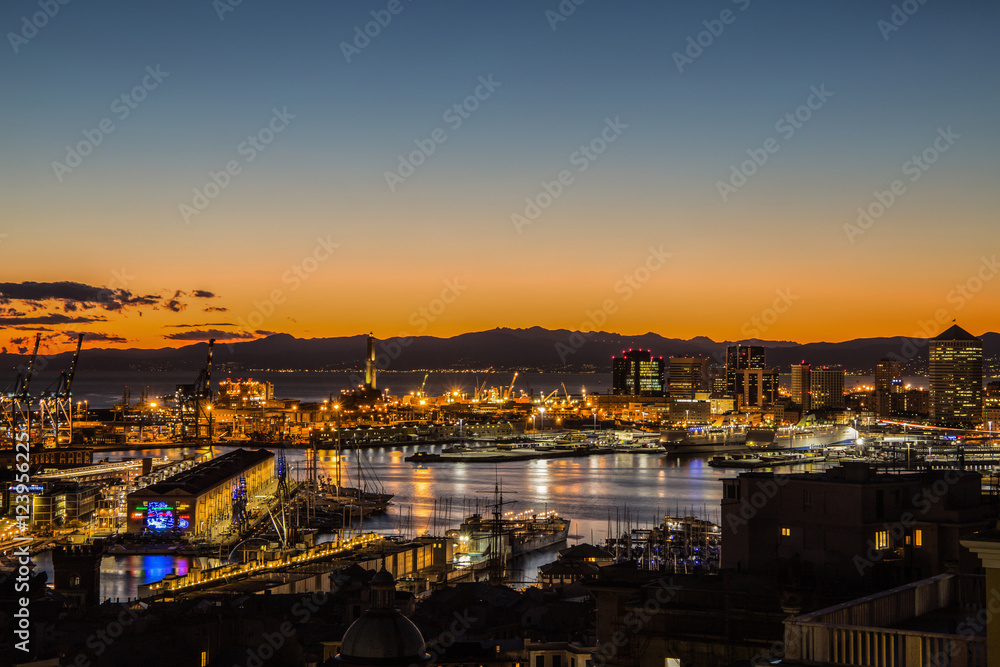 GENOA, ITALY, JANUARY 15, 2016: Sunset view of the city of Genoa, Italy/ Genoa landscape/ Genoa Skyline/ city landscape/ aereal view/ light/ city light/ orange/ sunshine
