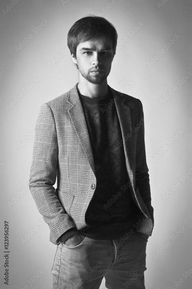 fashion man model dressed casual posing dramatic in the studio fashion man model dressed casual posing dramatic in the studio