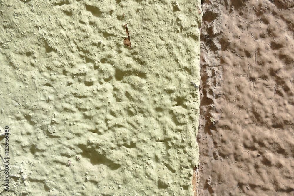 Braun und grüngelb bemalte Wand Braun und grüngelb bemalte Wand