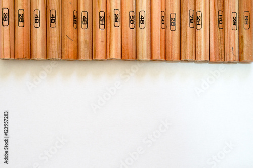 Wood made drawing pencils on white background