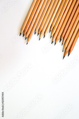 Wood made drawing pencils on white background