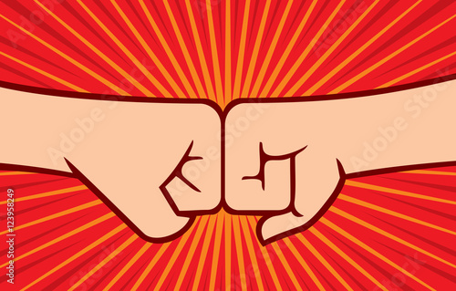two fists punching each other