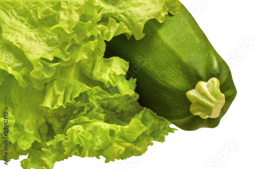 Zucchini and lettuce, isolated on white background photo