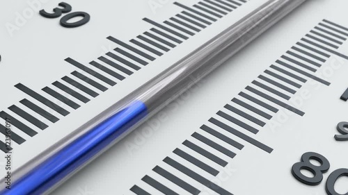 Close up at thermometer and decreasing temperature.