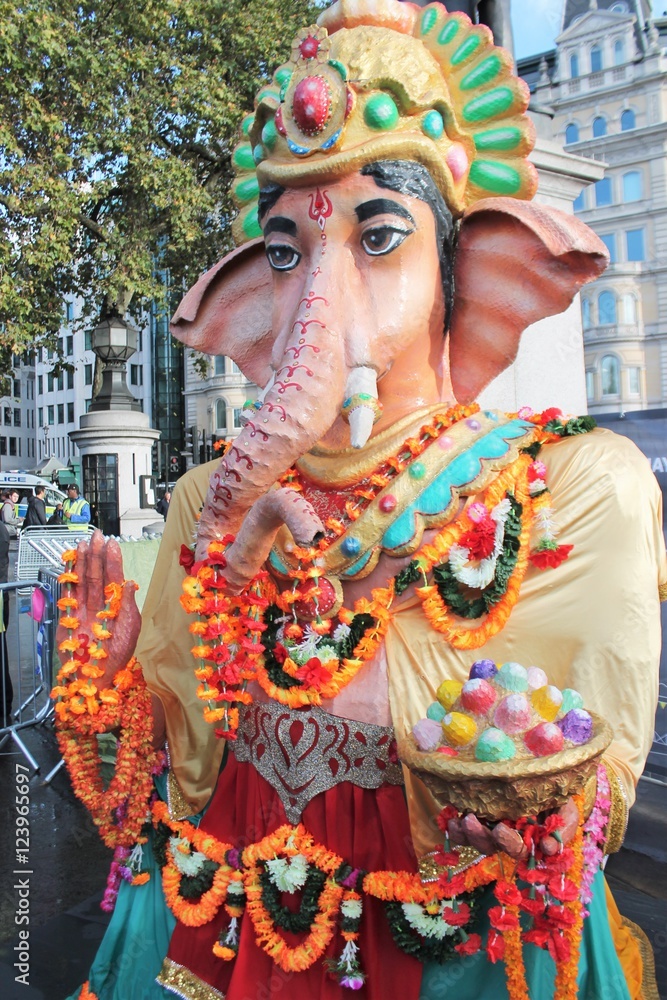 Ganesha statue flower offerings on Lord Ganesha Ganesh God statue