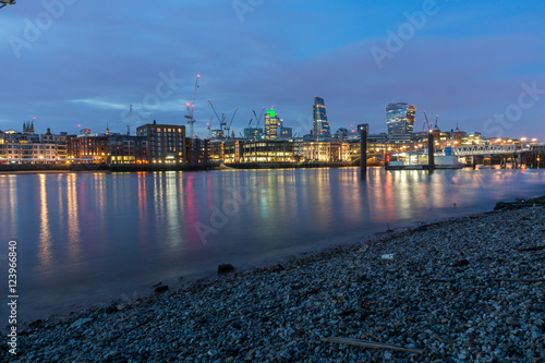 Night skyline of city of London and Thames river, England, Great Britain