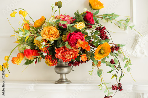 Fototapeta Naklejka Na Ścianę i Meble -  A cozy autumn decor. Autumn flowers.