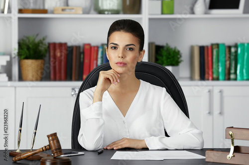 Beautiful young woman worki...
