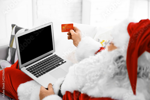 Santa Claus with credit car...