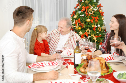 Happy family having Christm...