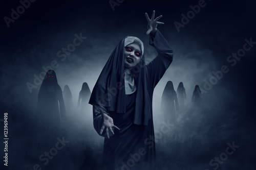 Obraz na plátne Young evil asian woman nun