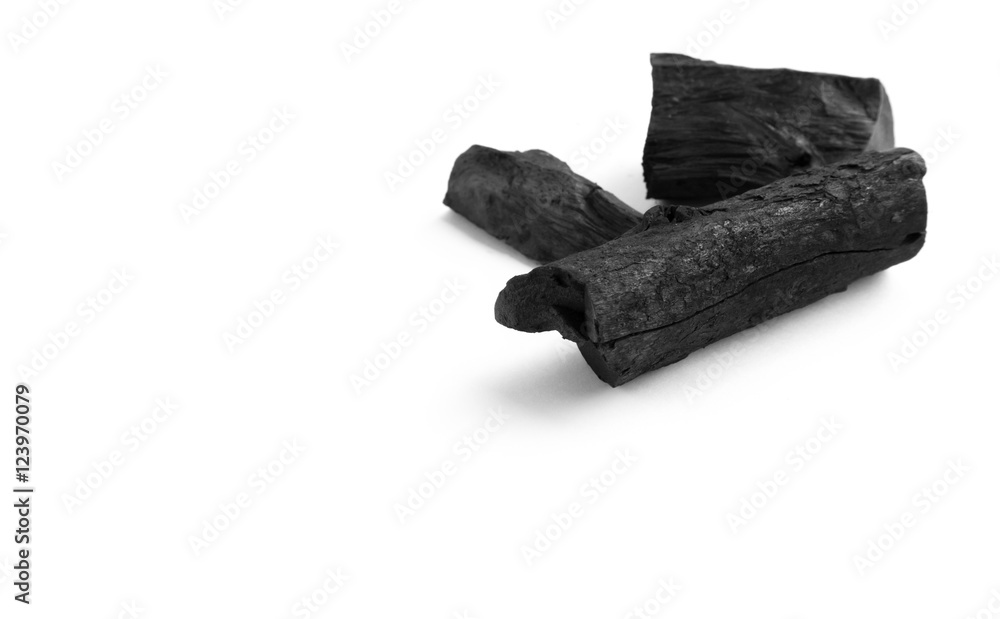 Black charcoal on white background Black charcoal on white background