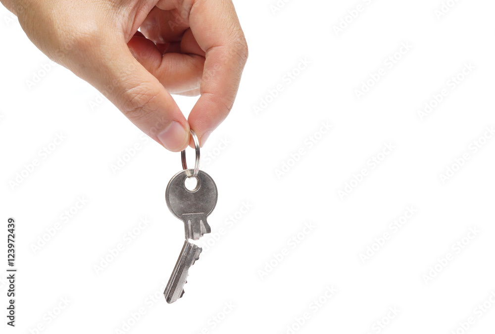 Closeup of hand holding a broken key isolated / Success and failure concept Closeup of hand holding a broken key isolated / Success and failure concept