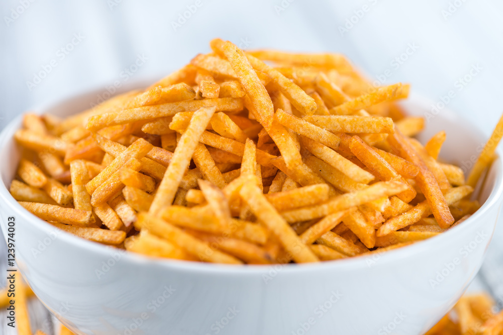 Bowl with Potato Sticks (close-up shot) Bowl with Potato Sticks (close-up shot)