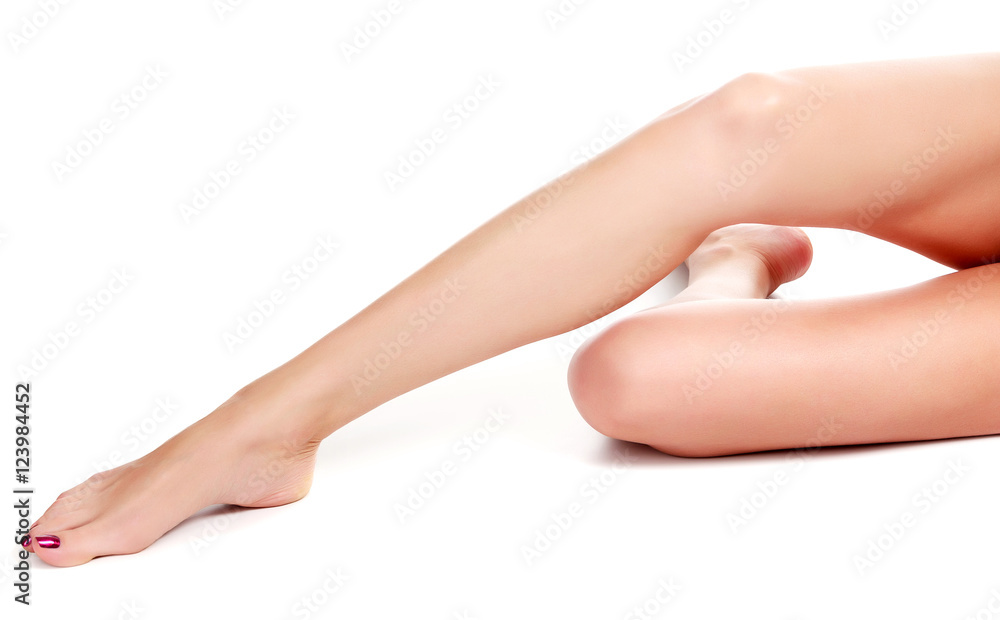 Woman legs on white background Woman legs on white background