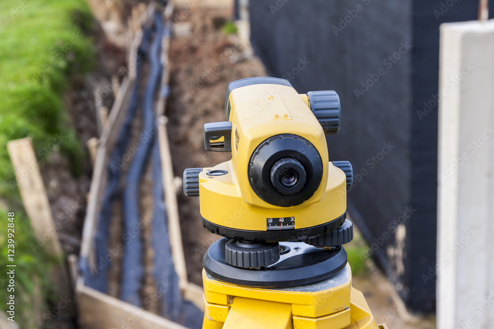 Surveyor equipment optical level at construction site Surveyor equipment optical level at construction site