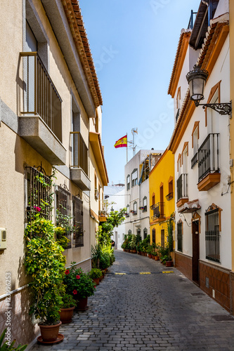 Beautiful narrow street in Almunecar (Almuñécar) old town, Spain 