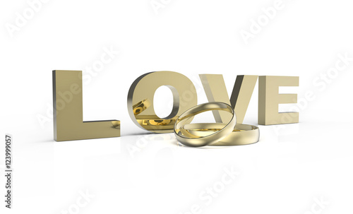 Złote obrączki z napisem miłość