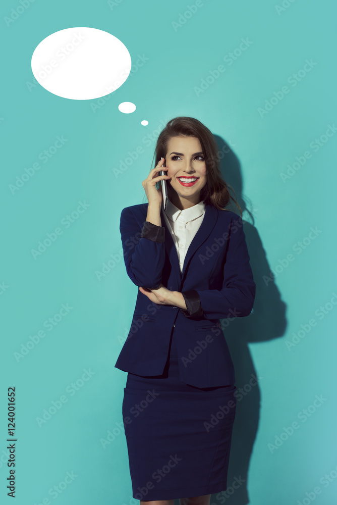 Young, confident, successful happy and beautiful business woman with the mobile phone isolated, Looking to the left. with comic speech bubbles icon Young, confident, successful happy and beautiful business woman with the mobile phone isolated, Looking to the left. with comic speech bubbles icon