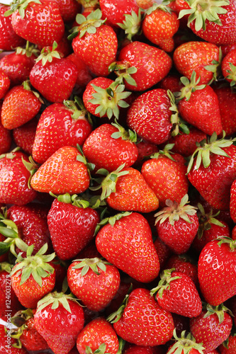 Fresh and tasty strawberries background, close up