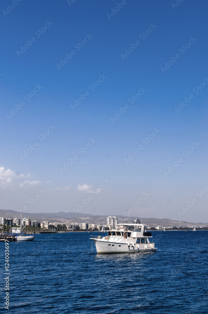 Beautiful white motor boat in the blue calm  Sea