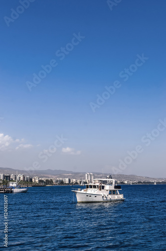 Beautiful white motor boat in the blue calm  Sea