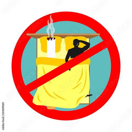 Forbidden to smoke in bed. Red sign prohibiting smoking. Ban smo