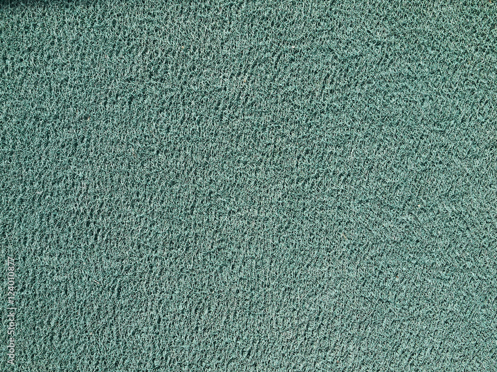 Green doormat texture background Green doormat texture background