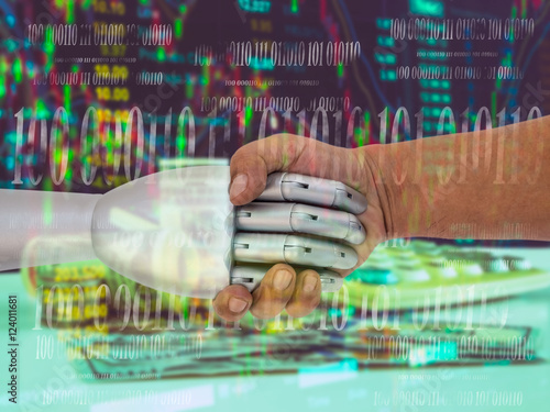 ROBO Advisor concept. Man and robot hand shaking  on abstract investment management background. photo