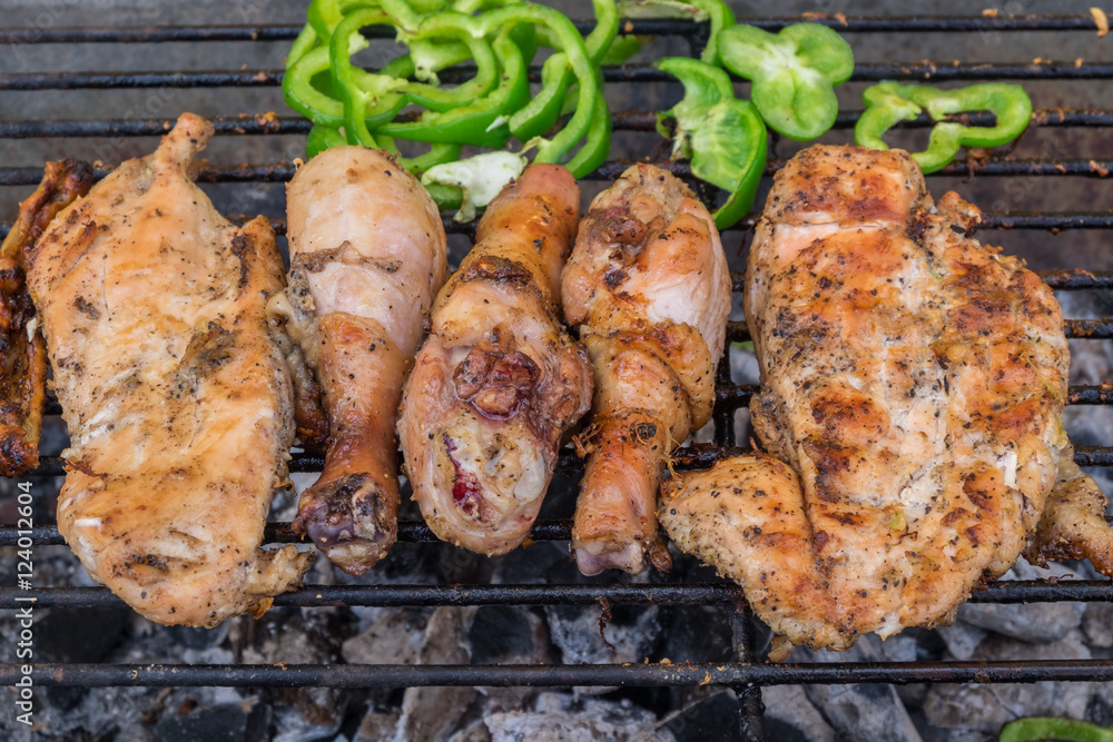 hot chicken on smoked grill barbecue, thai style food.(Selective focus) hot chicken on smoked grill barbecue, thai style food.(Selective focus)