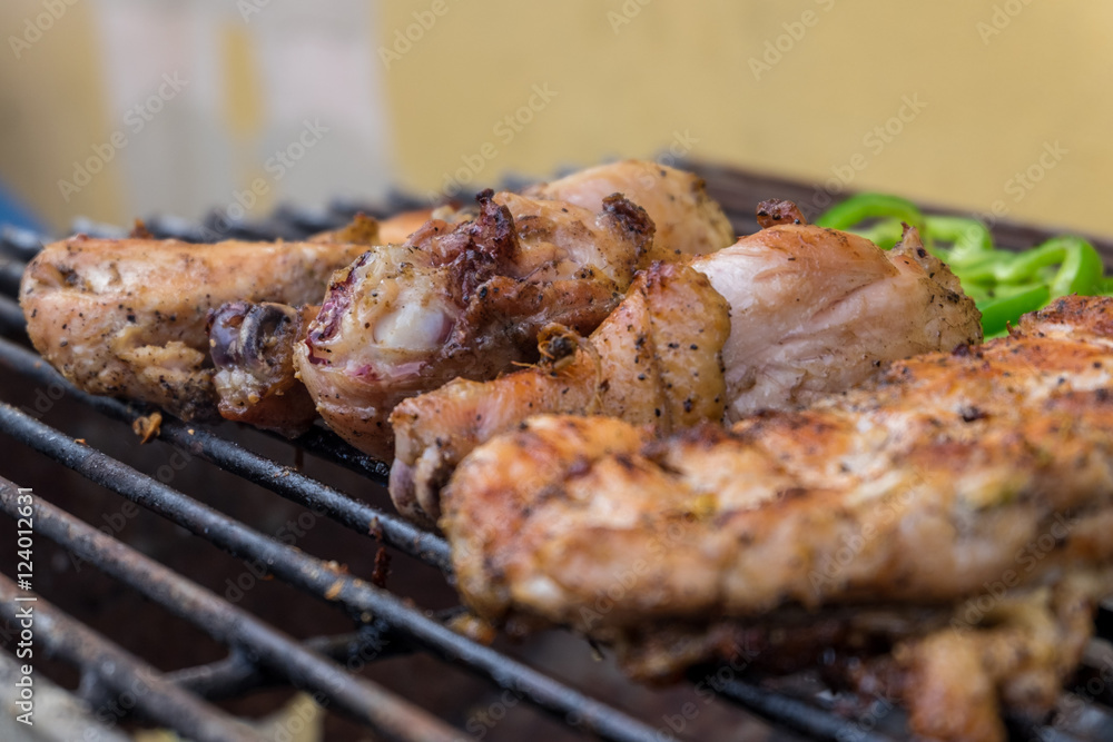 hot  chicken on smoked grill barbecue, thai style food.(Selectiv