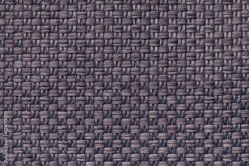 Dark brown textile background with checkered pattern, closeup. Structure of the fabric macro.