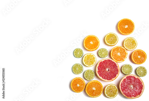 Sliced citrus isolated on white. Cut lemon  orange  grapefruit and lime.