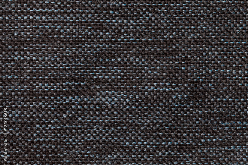 Black textile background with checkered pattern, closeup. Structure of the fabric macro. Black textile background with checkered pattern, closeup. Structure of the fabric macro.