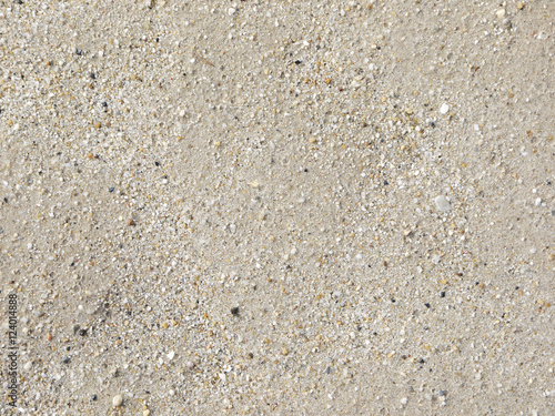 Coarse sand background texture. Macro of coarse sand grains.