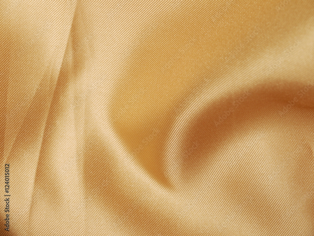 Fototapeta premium Gold thread on the fabric