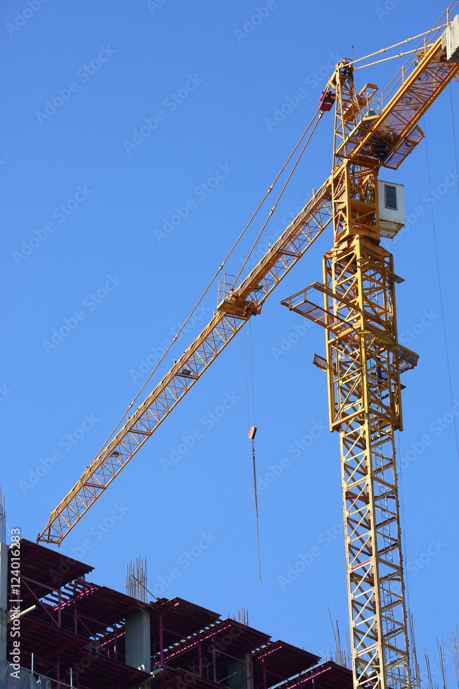 machinery crane working in construction site building