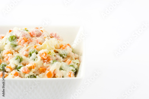 Russian salad isolated on white background