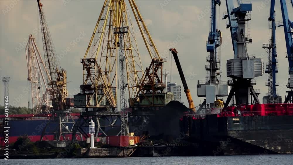Port work. Many large cranes transshipped coal port. Port work. Many large cranes transshipped coal port.