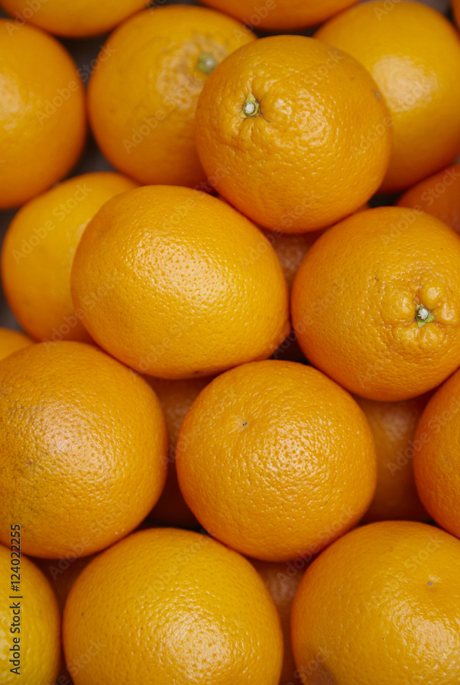 A whole page of whole ripe oranges background texture A whole page of whole ripe oranges background texture