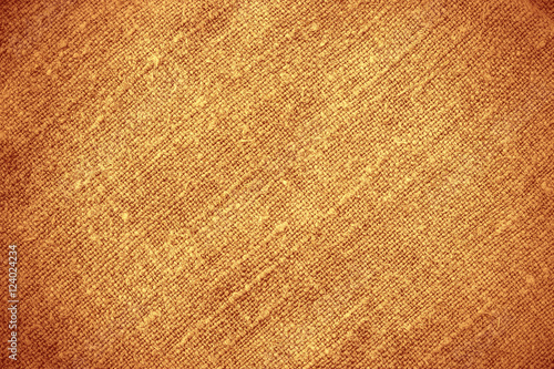 Brown linen background closeup. Macro. Old grungy fabric. Ancient texture. Denim material.