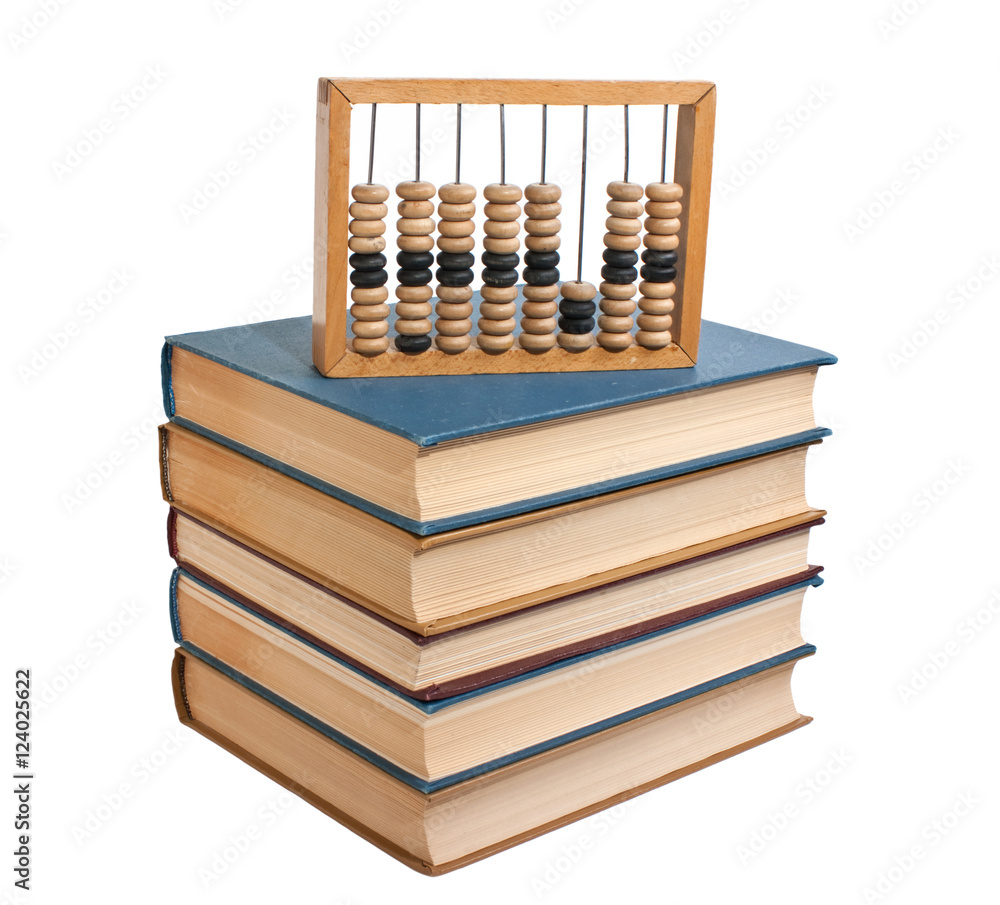 Wooden abacus on a pile of books Wooden abacus on a pile of books
