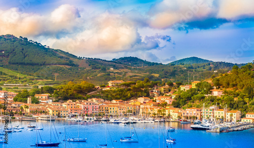 Harbor and village  Porto Azzurro at sunset, Elba islands, Tuscany, Italy photo