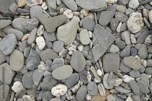 A whole page of grey pebble beach background texture